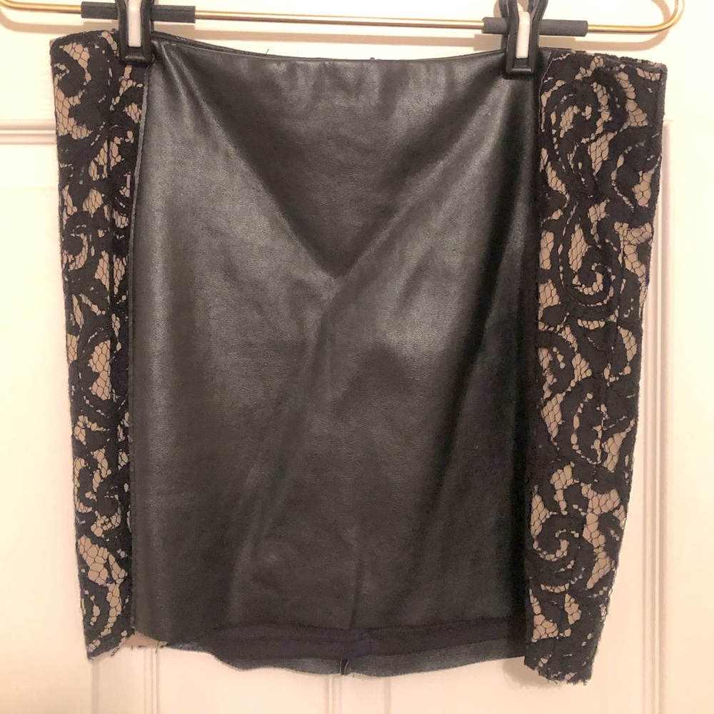 Black faux leather mini skirt with lace detail